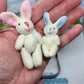 🐇 62% OFF! 🐇 Bunny Mummy & Baby Plush Pocket Tin – Handmade Easter Collectible with Cozy Blanket (Pink/Blue Ears) 🐇🎁